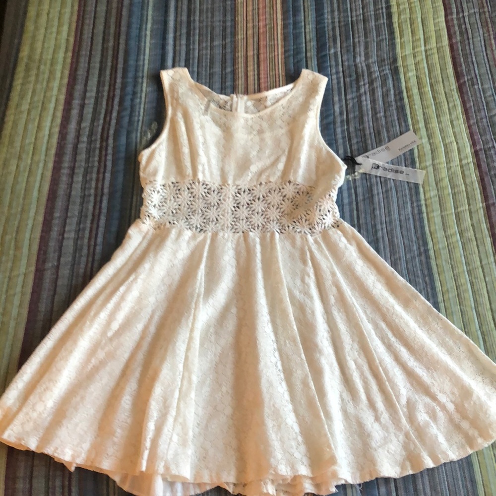 Women’s large dress in mini and a cream color